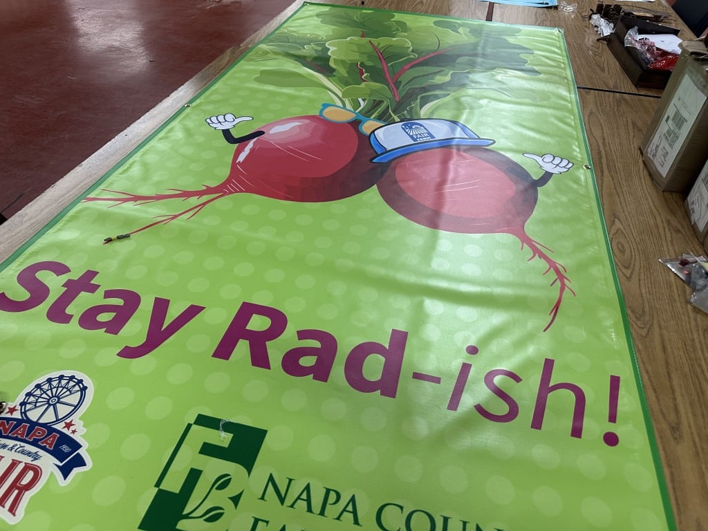 Farm Fair radish station sign under construction. Lisa Adams Walter photo