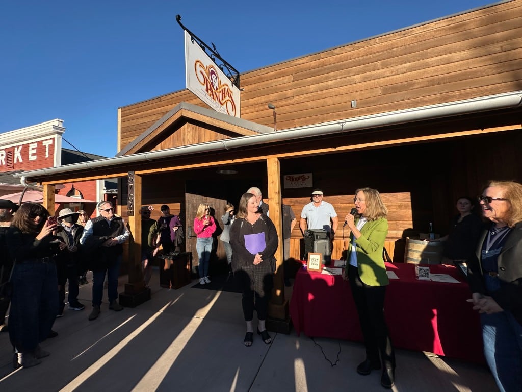 Natalie Leighton of the Yountville Chamber of Commerce (center) emceed, while Napa County Supervisor Anne Cottrell (in green) welcomed guests. Lisa Adams Walter photo