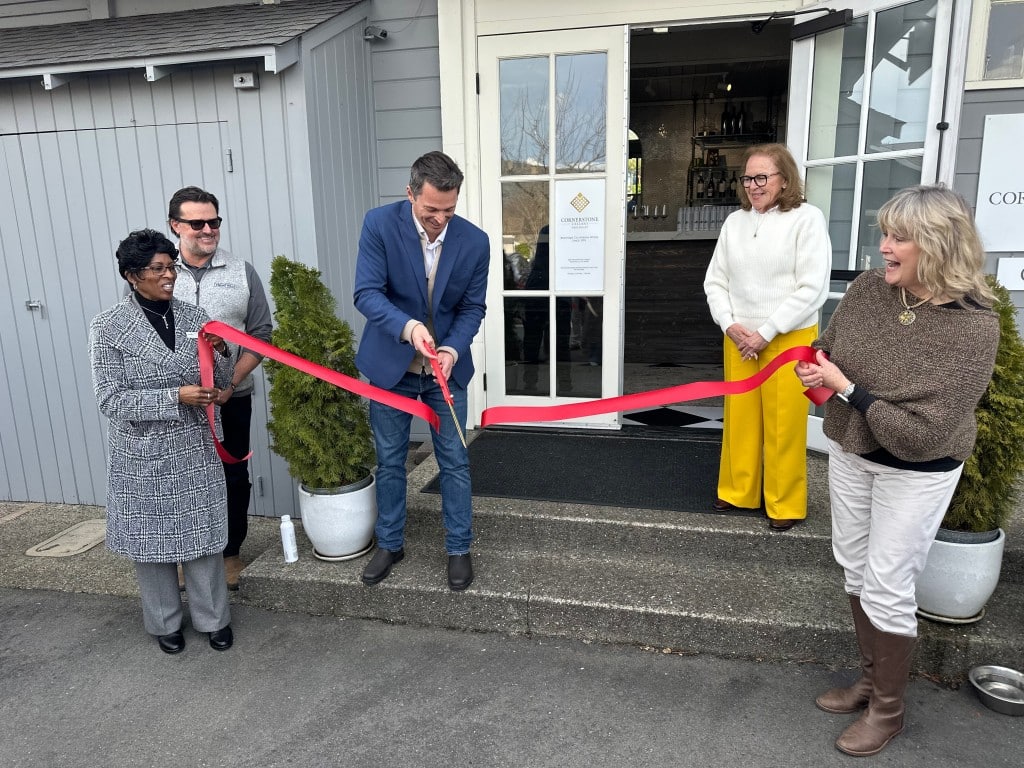 Matt Mills, surrounded by Town of Yountville officials, cuts the ribbon officially opening The Yount Room on Feb. 20. Lisa Adams Walter photo