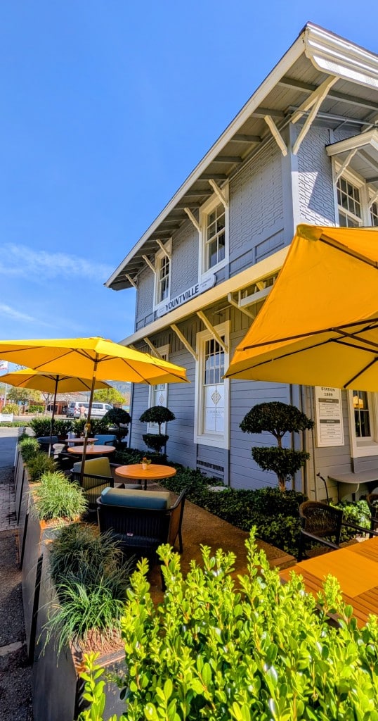 The Yount Room, now open inside the historic Yountville Depot, feautres a newly refreshed patio with bright yellow umbrellas visible from Washington St. Submitted photo