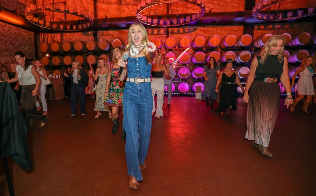Rachel Richied leads late-night line dancing at Rock the V at The Estate Yountville. V Foundation photo