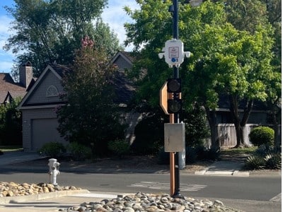 The new flood warning system will flash yellow and red lights if waters dangerously rise on Oak Circle. Kimberly Cook photo