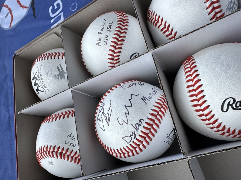 The Mixed Nutts presented each Bouchon Bistro team member with a baseball signed by the veterans. Lisa Adams Walter photo