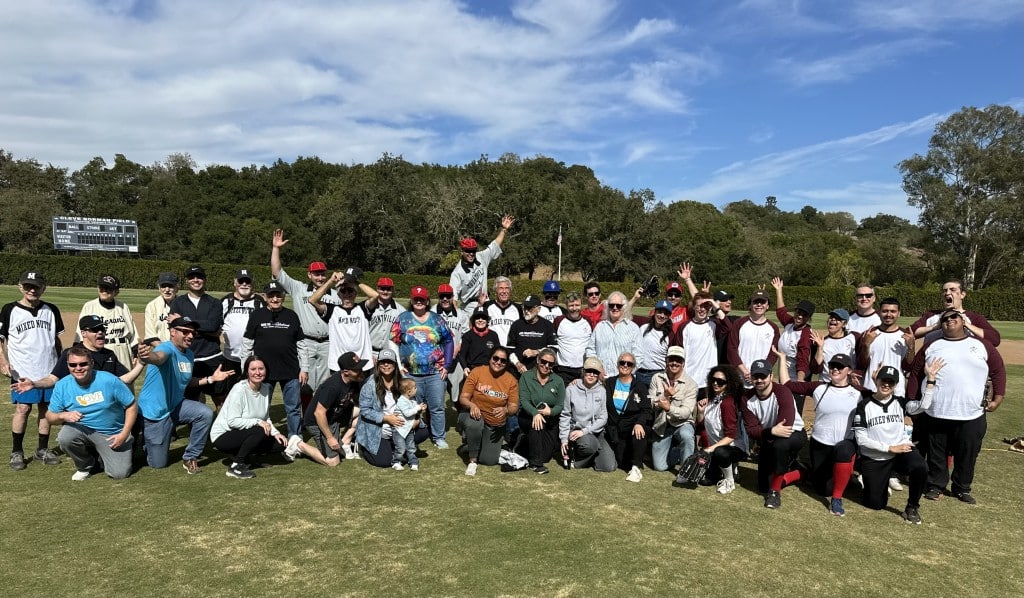 The Mixed Nutts and Bouchon Bistro Baguettes teams celebrate on Borman Field on Oct. 20. Lisa Adams Walter photo
